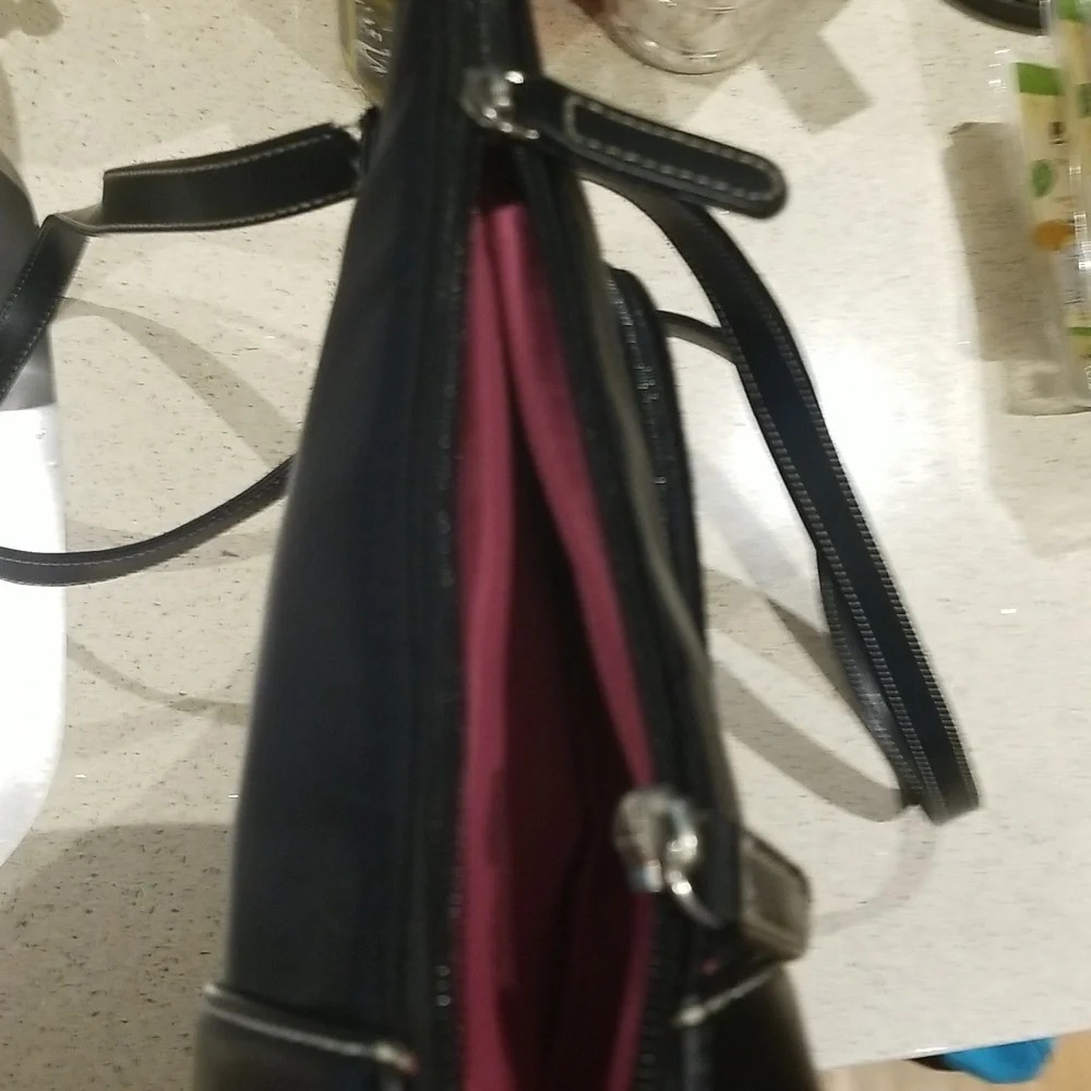 Computer tote w/ many storage area padded for computer